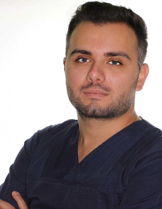 Dr. Kamil Arraj